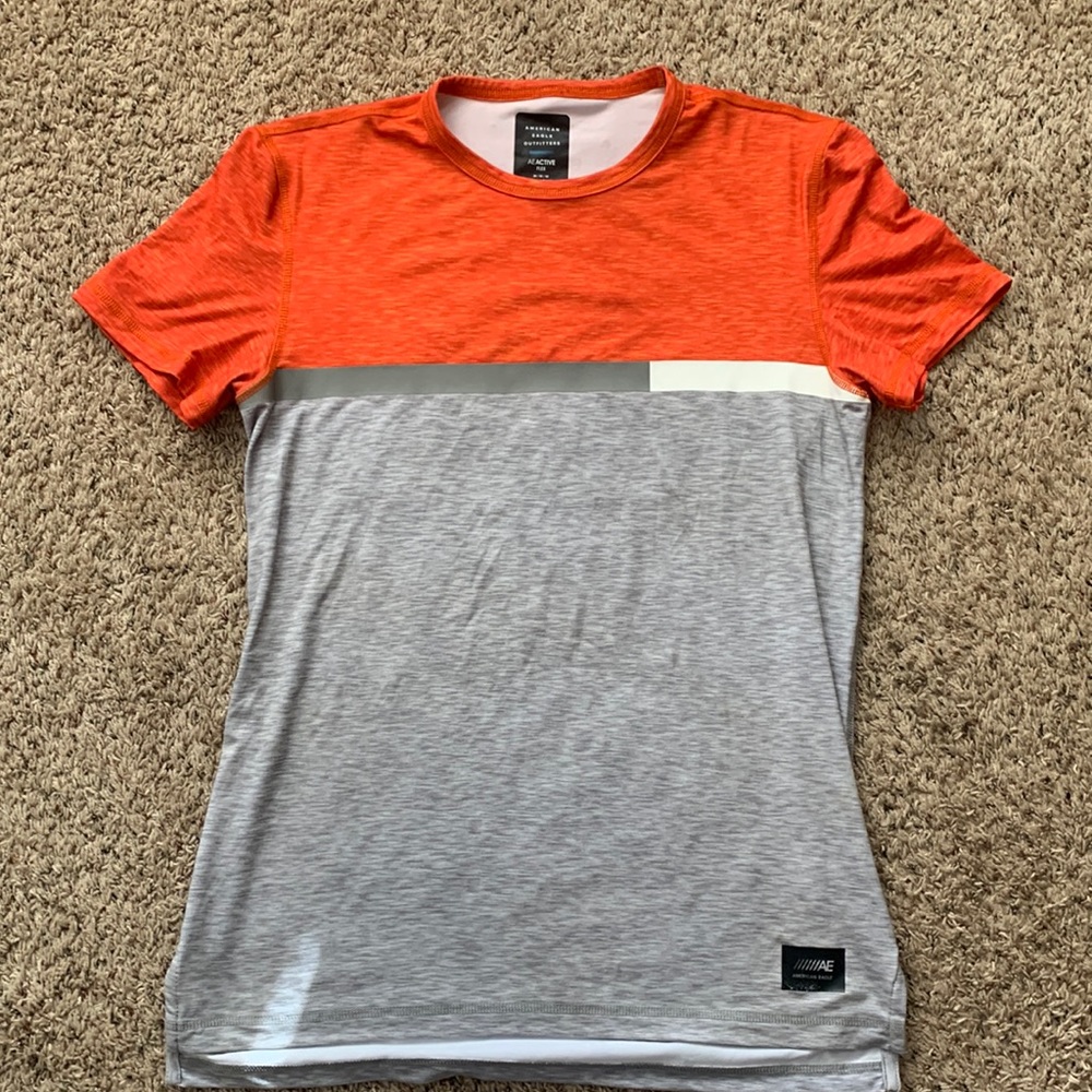 AE Flex shirt. Orange/Heather Grey